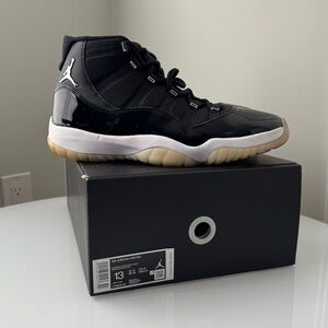 Air Jordan Retro 11 Jubilee Black, White, and Silver Sneakers Size 13